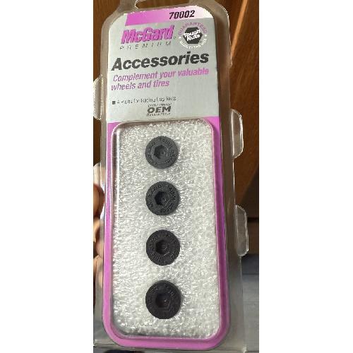 Caches Boulons 4 Bouchons en nylon noir Mcgard 70002 pour la gamme Racing