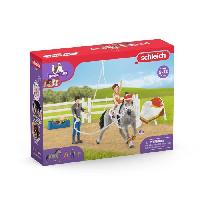 Figurine Miniature - Personnage Miniature Coffret d'entraînement a la voltige de Mia. coffret schleich avec 18 éléments inclus dont 1 cheval schleich et 2 personnages.