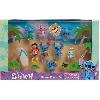 Figurine Miniature - Personnage Miniature Figurines et accessoires - LICENCE /STITCH - Coffret Deluxe - 13 figurines et accessoires. Stitch dans 5 poses. planche de surf