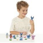 Figurine Miniature - Personnage Miniature Figurines et accessoires - LICENCE /STITCH - Coffret Deluxe - 13 figurines et accessoires. Stitch dans 5 poses. planche de surf